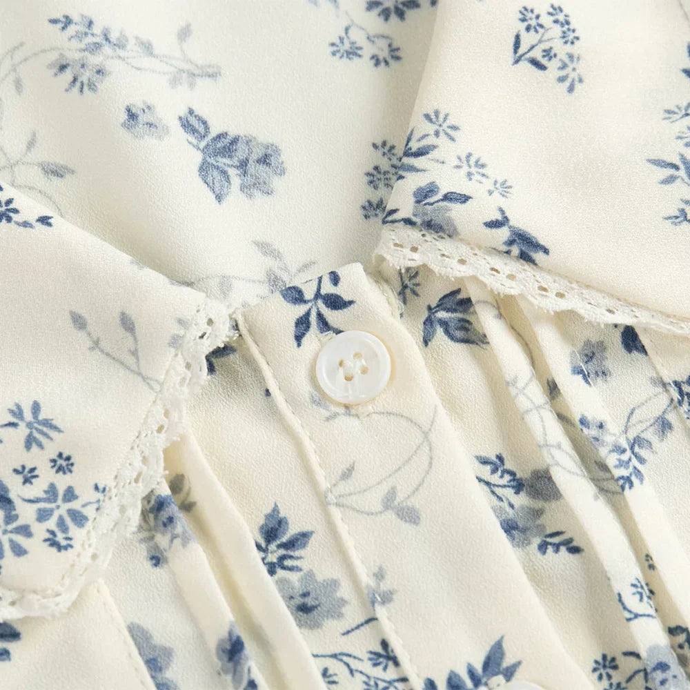blouse met bloemenpatroon en kanten zoom