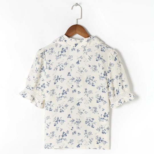blouse met bloemenpatroon en kanten zoom