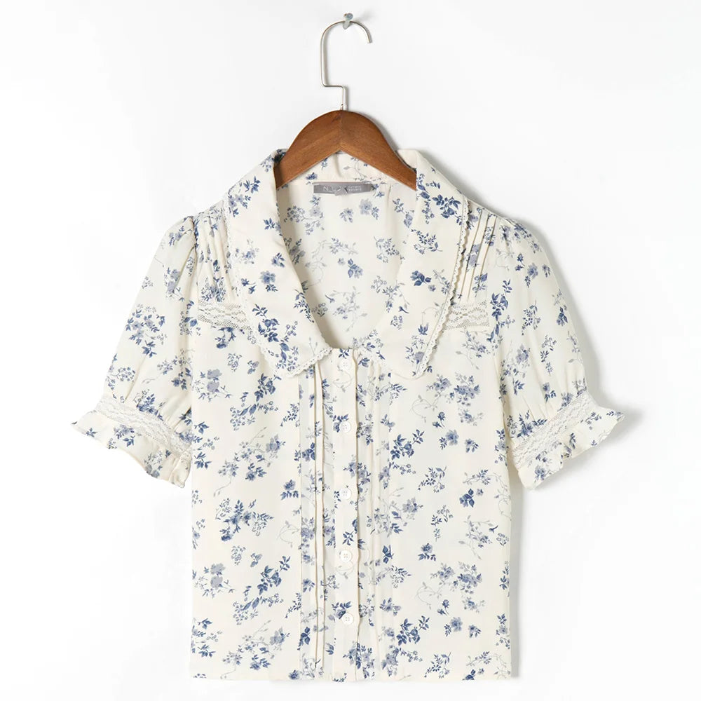 blouse met bloemenpatroon en kanten zoom