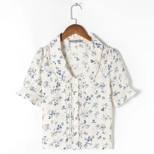 blouse met bloemenpatroon en kanten zoom