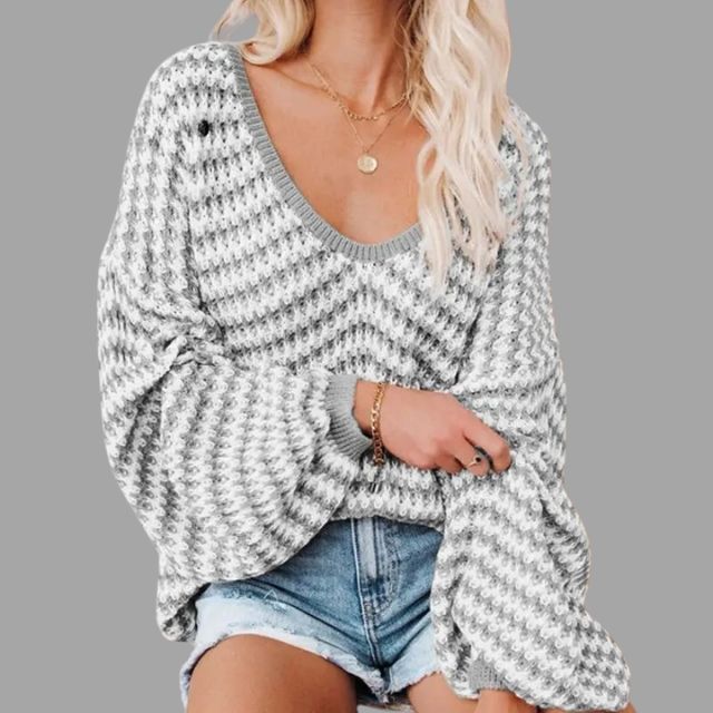 trui met off-the-shoulder design