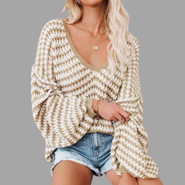 trui met off-the-shoulder design