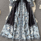 A-Linienkleid mit Gürtel und Blumenmuster