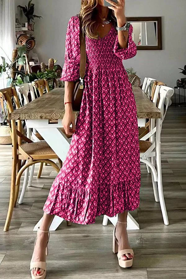 Großes Swingkleid mit V-Ausschnitt, langem Rock und Taille, Blumendruck