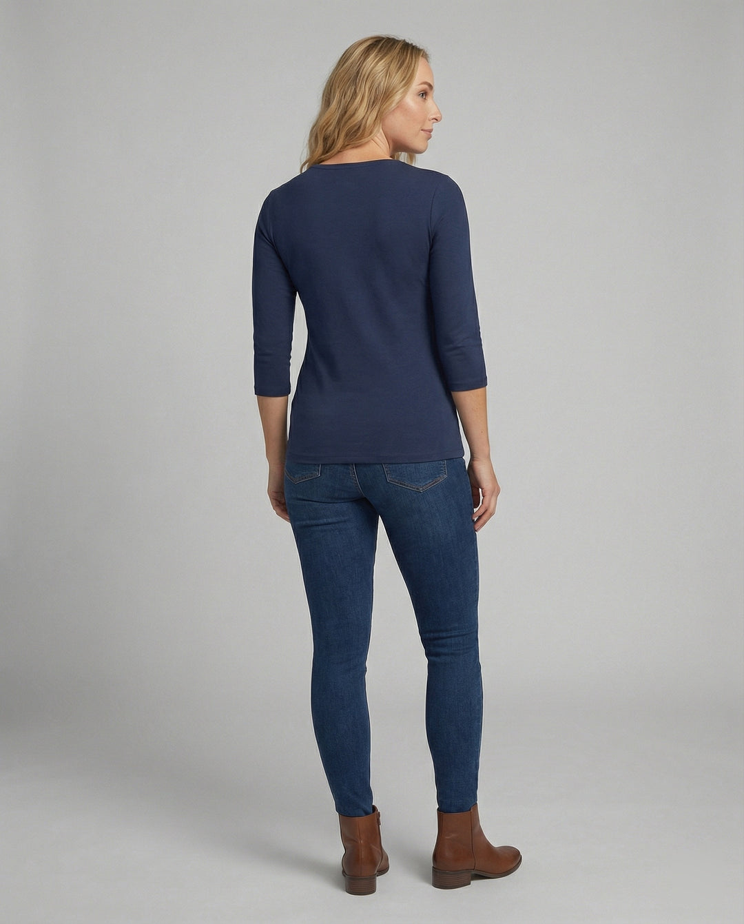 Damen Lässiges Oberteil mit Eleganten 3/4-Ärmeln und Geschwungenem Saum Heidi-Mode