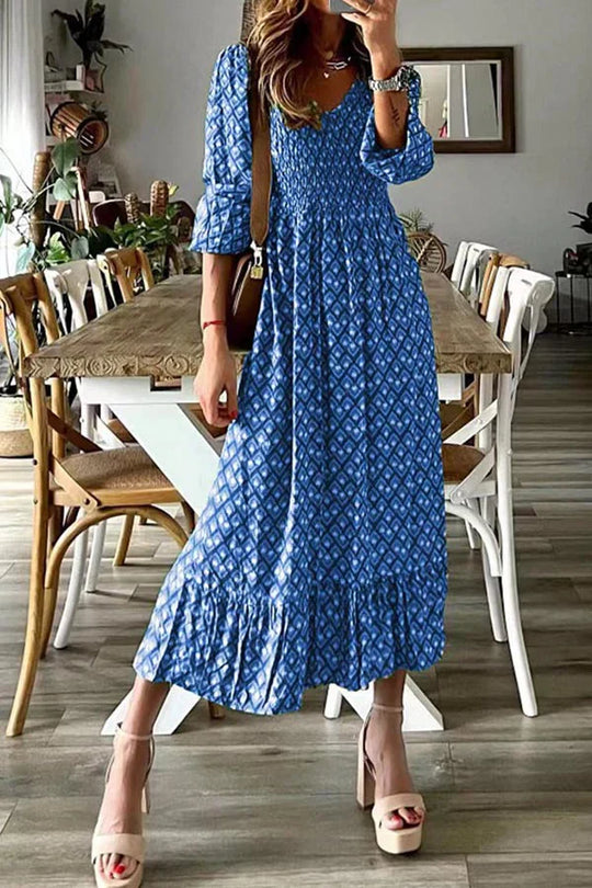 Großes Swingkleid mit V-Ausschnitt, langem Rock und Taille, Blumendruck
