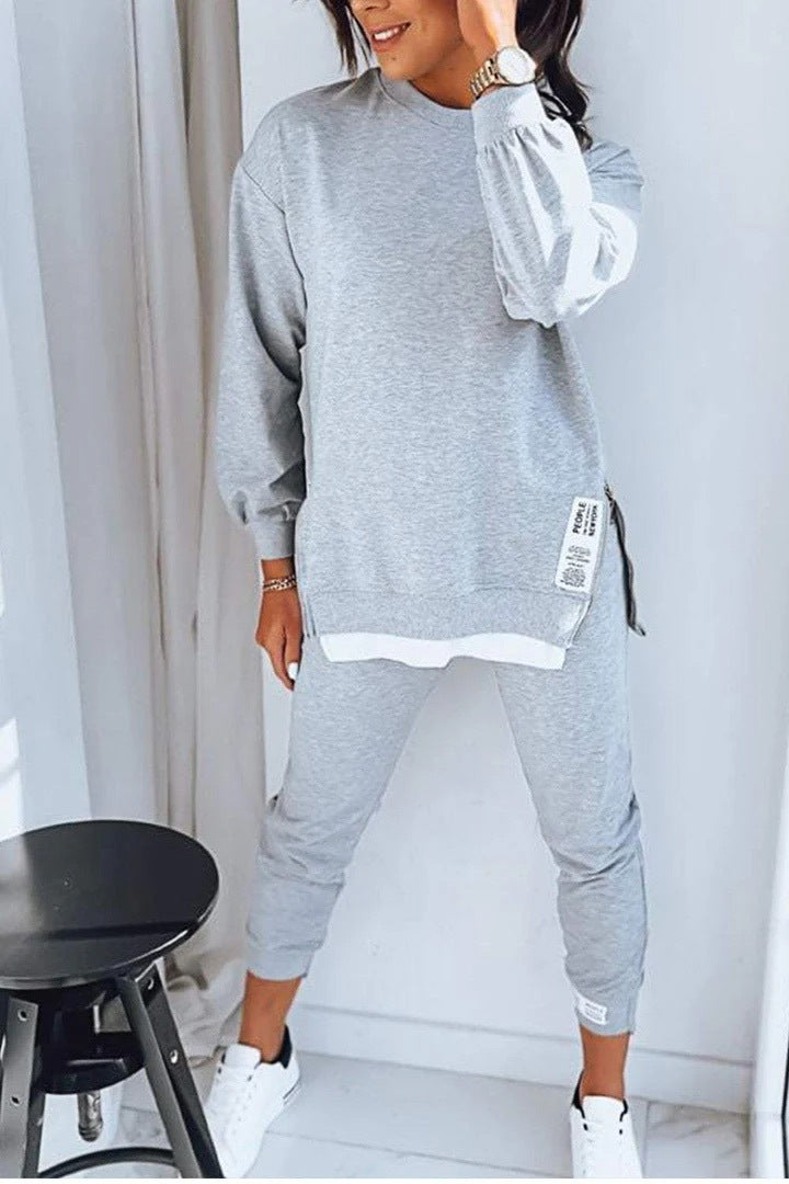 Heidi-Mode | Modevolles Sportset mit Schlitzdesign Sweatshirt und Slim Fit Hosen