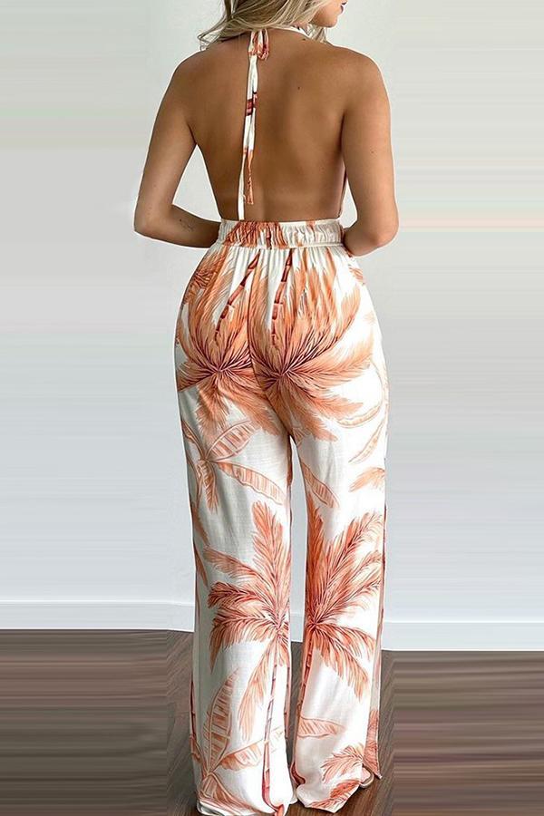 Heidi-Mode | Carneros Floral Print Halter Breite Beine Jumpsuit