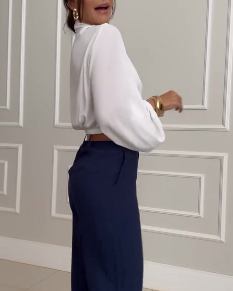 Heidi-Mode | Stilvolle weiße Bluse mit Lampionärmeln und V-Ausschnitt