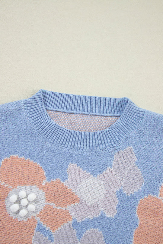 Heidi-Mode | Blauer Strickpullover Mit Rundhalsausschnitt Und Blumenmuster Mit Hängenden Schultern