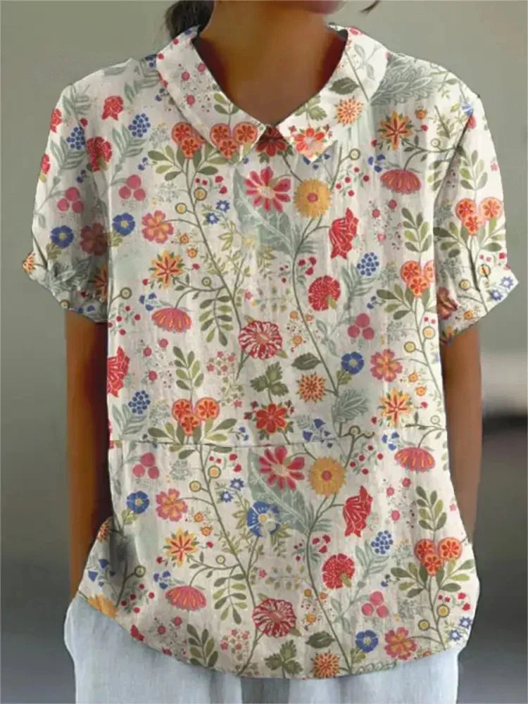 Heidi-Mode | Kurzarm Bluse mit floralem Muster und Kragen