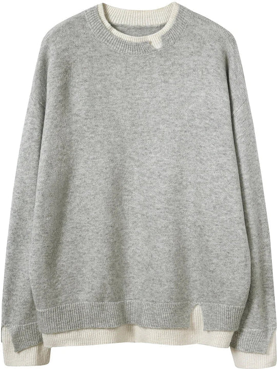 Grauer und weißer Pullover