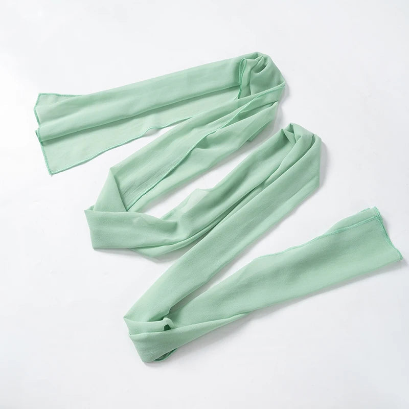 Luftiges mintgrünes Kleid mit Rüschenschichten