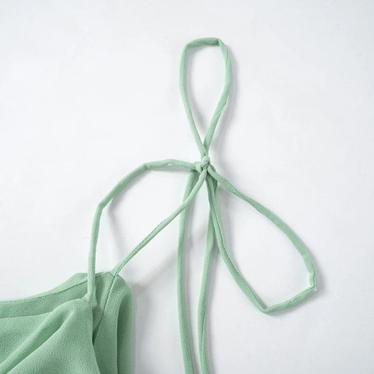 Luftiges mintgrünes Kleid mit Rüschenschichten