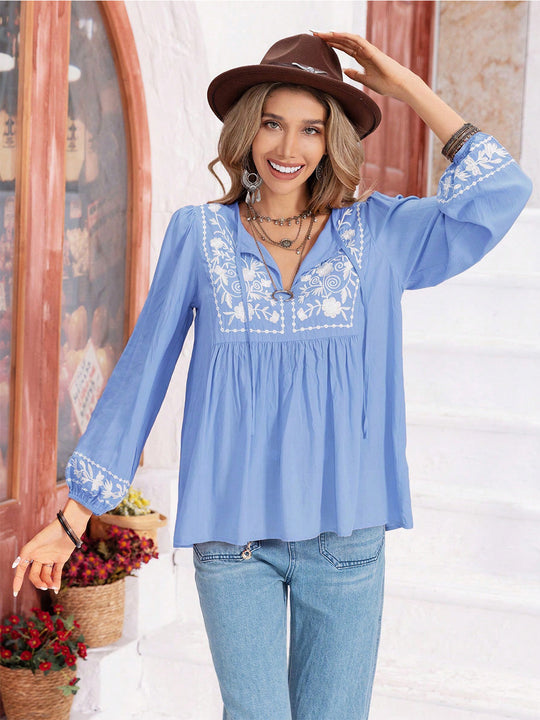 Heidi-Mode | Florale Bindekragen Bluse mit Ballonärmeln