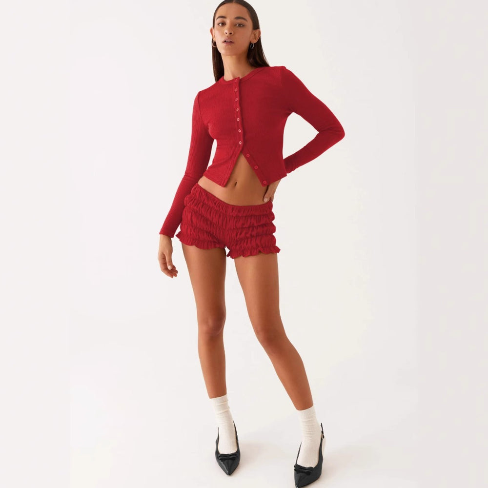 Heidi Mode | Einfarbige schmal geschnittene lange Strickjacke