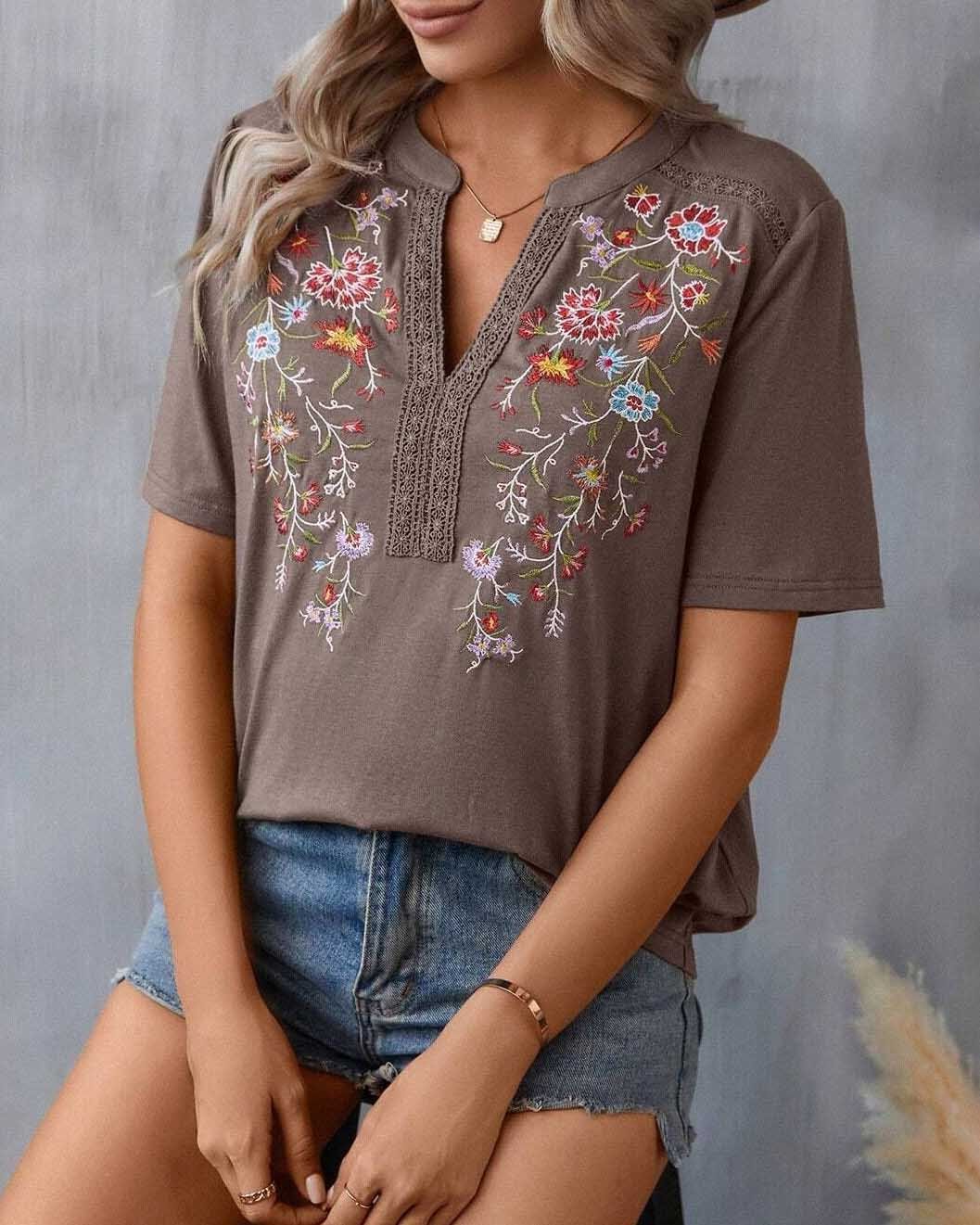 Heidi-Mode | Elegante Bluse mit Blumenstickerei V-ausschnitt und Kurzen Ärmeln