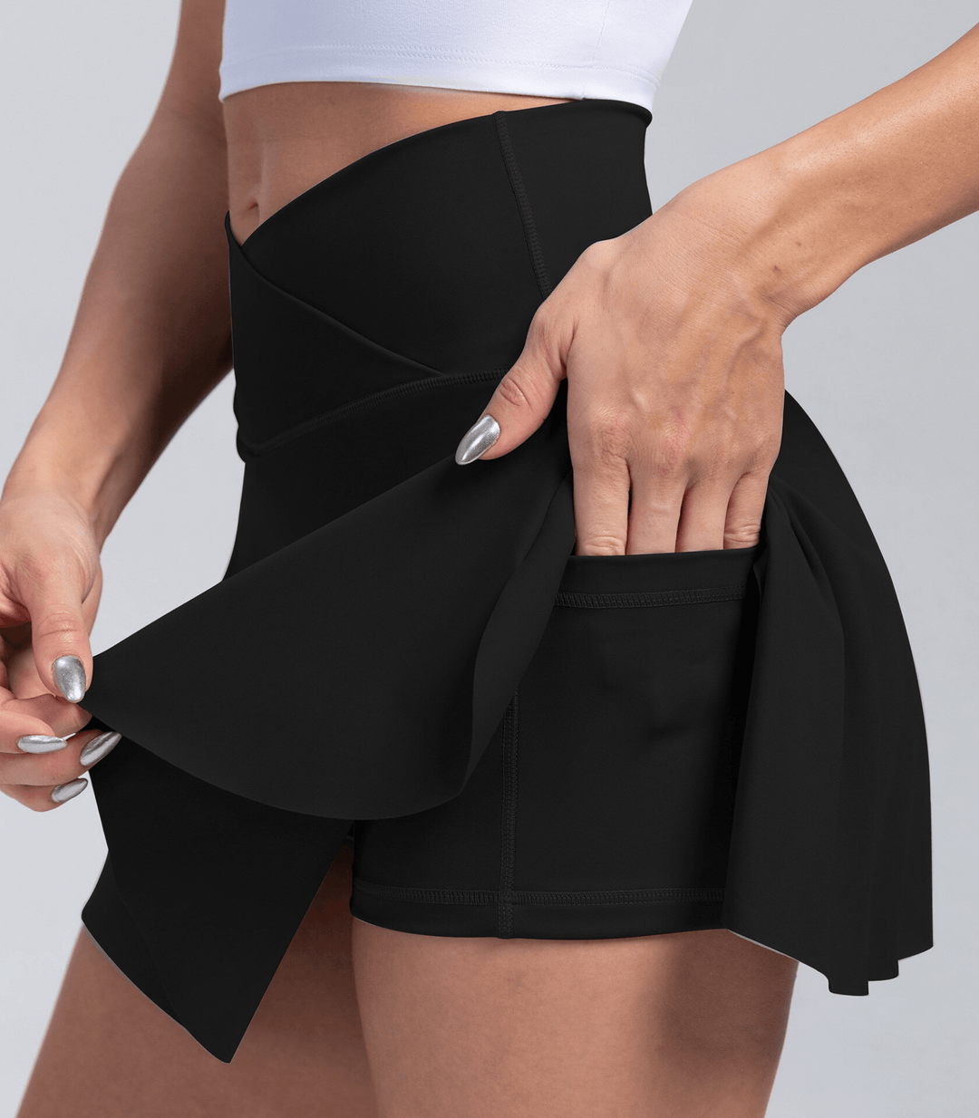 Plissierter Tennisrock mit V-Taille und Taschen Schwarz