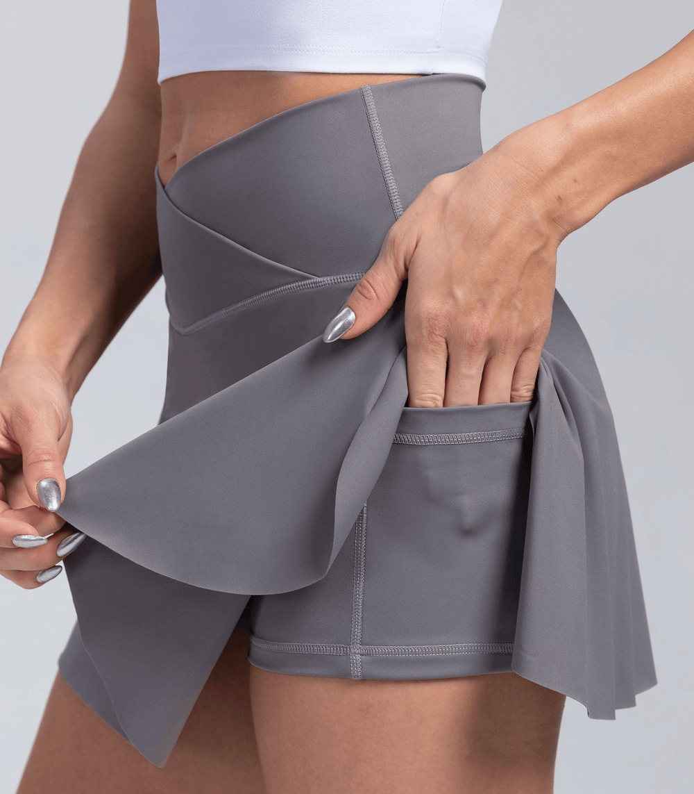 Plissierter Tennisrock mit V-Taille und Taschen Schwarz