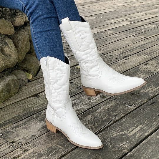 Elegante metallische Cowboy-Stiefel